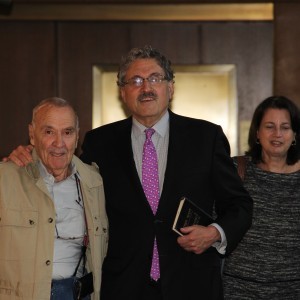 Rabbi Robert N. Levine with two members