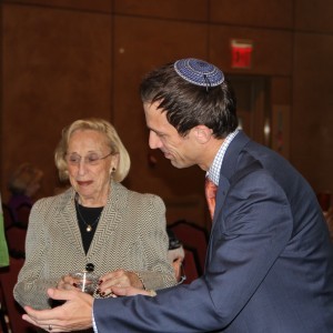 Rabbi Ben H. Spratt has a conversation with some members